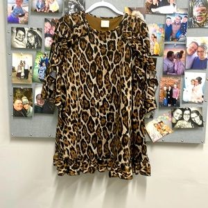 Leopard swing top